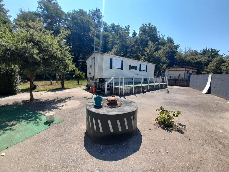 Foto 9772328e-7bdb-4d1d-845b-905f78c13d09. Casa  prefabricada, 2 dormitorios, amueblada, con luz, agua y calefacción. parcela cerrada con portal automático. en Ponteareas