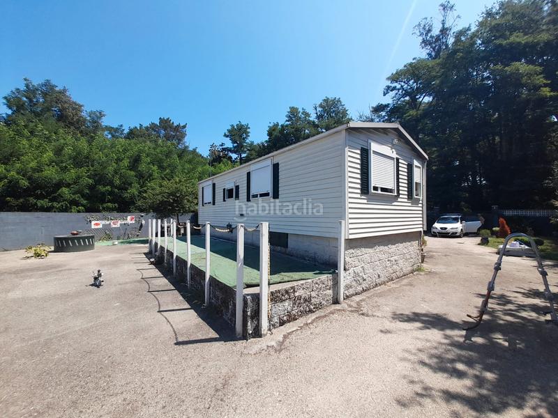 Foto a46016f1-e5db-4614-add4-2d0ab1102059. Casa  prefabricada, 2 dormitorios, amueblada, con luz, agua y calefacción. parcela cerrada con portal automático. en Ponteareas