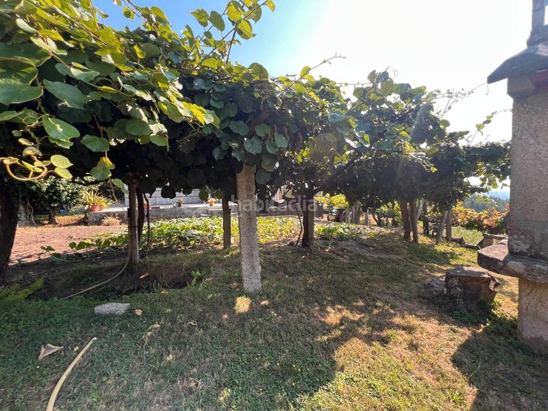 Foto 665281f4-37e9-438a-84f4-d27bc8d6d9a6. Chalet casa de piedra de 4 dormitorios, parcela 3880m2 en Neves (As)