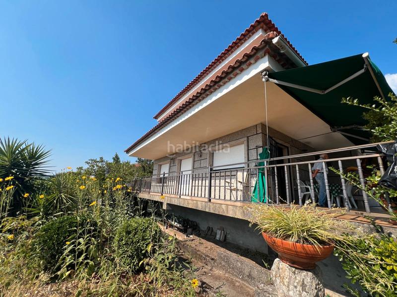 Foto b3754378-f87b-4b75-8b7d-8292c7b69c47. Chalet casa de piedra de 4 dormitorios, parcela 3880m2 en Neves (As)