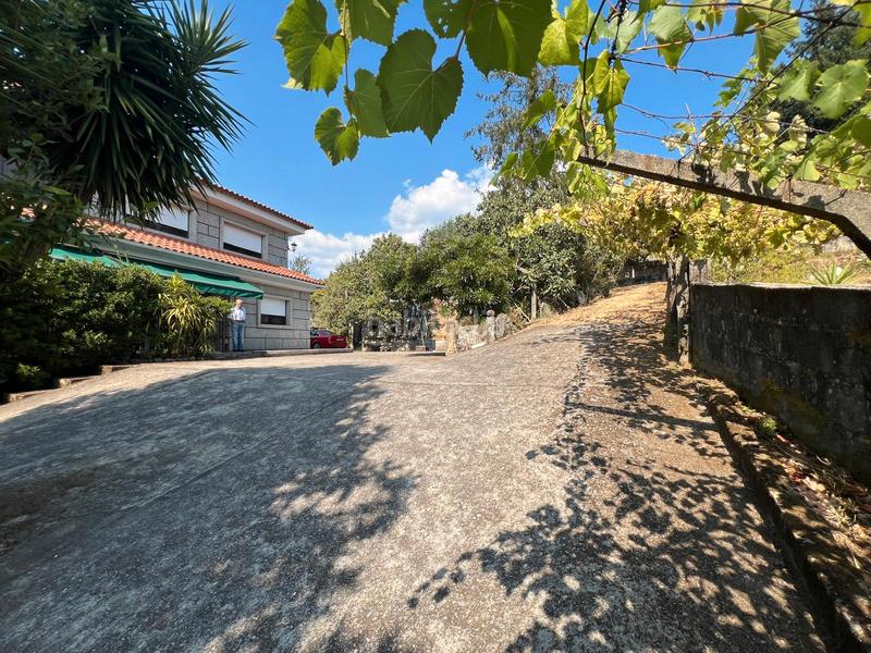 Foto b7322a0d-d357-423f-bed9-ba0f31b4e7e4. Chalet casa de piedra de 4 dormitorios, parcela 3880m2 en Neves (As)