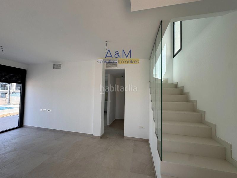 Foto 9ae7d2a4-6a20-48f6-b26e-5b3e454f576f. Casa aparellada amb aparcament piscina a Monte y Mar Santa Pola
