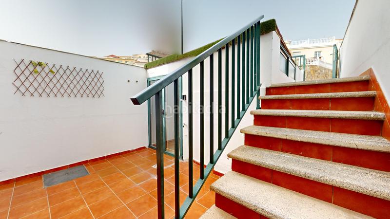 Foto bc9f72f2-11eb-4941-b51d-47b8b5a67367. Reihenhaus mit parking in Arguineguín Mogán