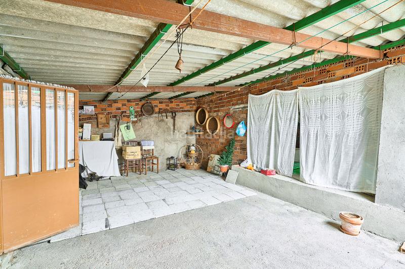 Foto c844132d-8154-4db1-b1f2-fd944bff4387. Casa adossada amb aparcament a Fuentesaúco