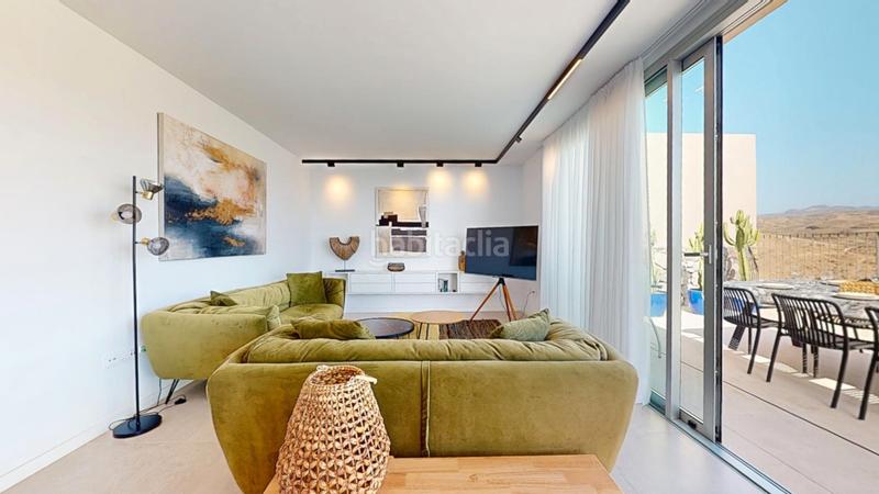 Foto f3a4a0ff-6e82-4fd3-bbae-6e08e52fbed4. Chalet avec parking piscine dans Salobre Golf San Bartolomé de Tirajana