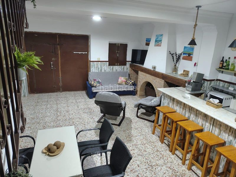 Foto 0edc4026-4a3f-4a3c-b6ec-f6e3a50162ff. Casa adossada a Chucena
