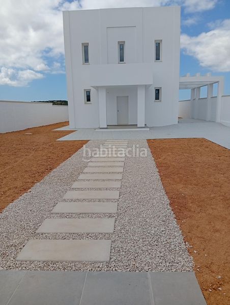 Foto 1b9053b8-3dfa-4356-bb37-3f34a0cb066e. Casa amb aparcament piscina a Costa Esuri Ayamonte