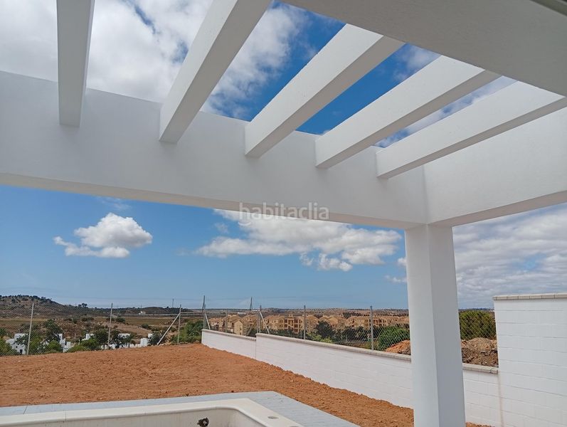 Foto bad447e5-9335-4abf-ade9-4c2ee5cf1256. Casa amb aparcament piscina a Costa Esuri Ayamonte