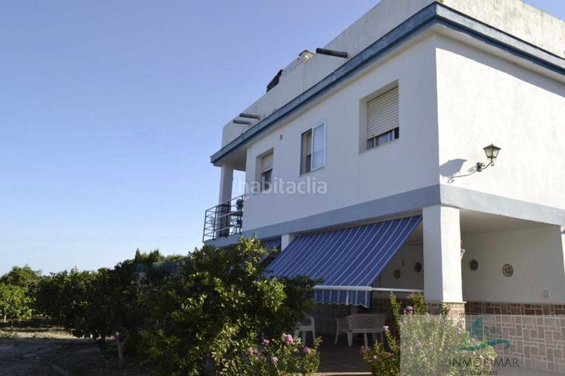 Foto c3bcbabd-f294-4bbf-befb-ed172a607e7a. Masía finca rustica en Centro Salobreña