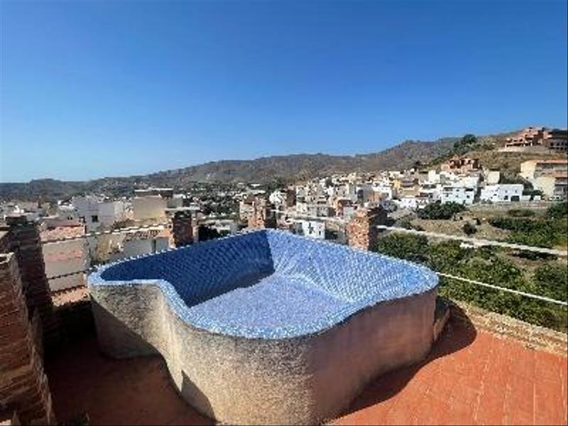 Foto bb1510e9-faec-40b4-bb33-777186caf921. Maison avec piscine dans Molvízar