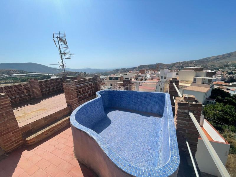 Foto bc683d51-43ec-45c3-b024-a393b6d0e438. Maison avec piscine dans Molvízar