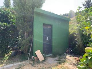 Finca rústica en Vélez de Benaudalla. Finca rústica en venta con cultivos de aguacate y acceso facil
