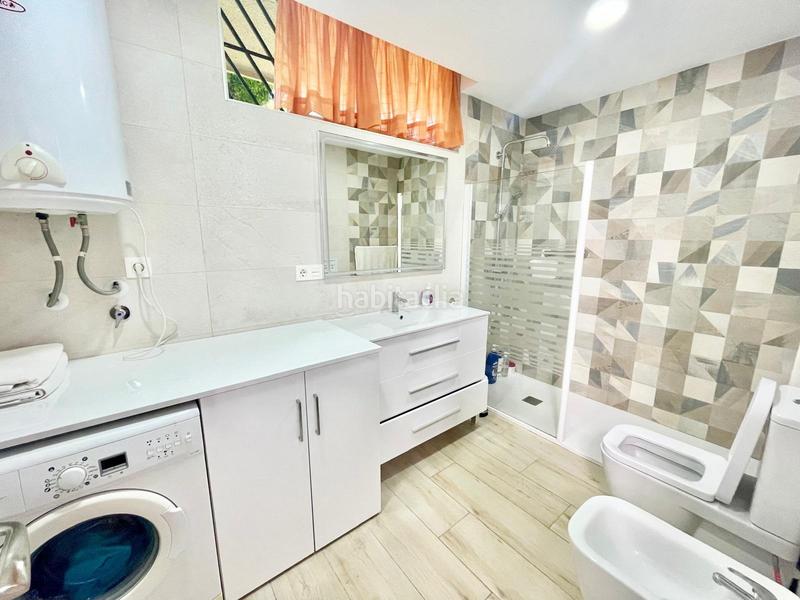 Foto e7e8d0d0-6c67-46a3-8111-5c937bd25b05. Planta baja exclusiva planta baja en primera línea de playa en Salobreña