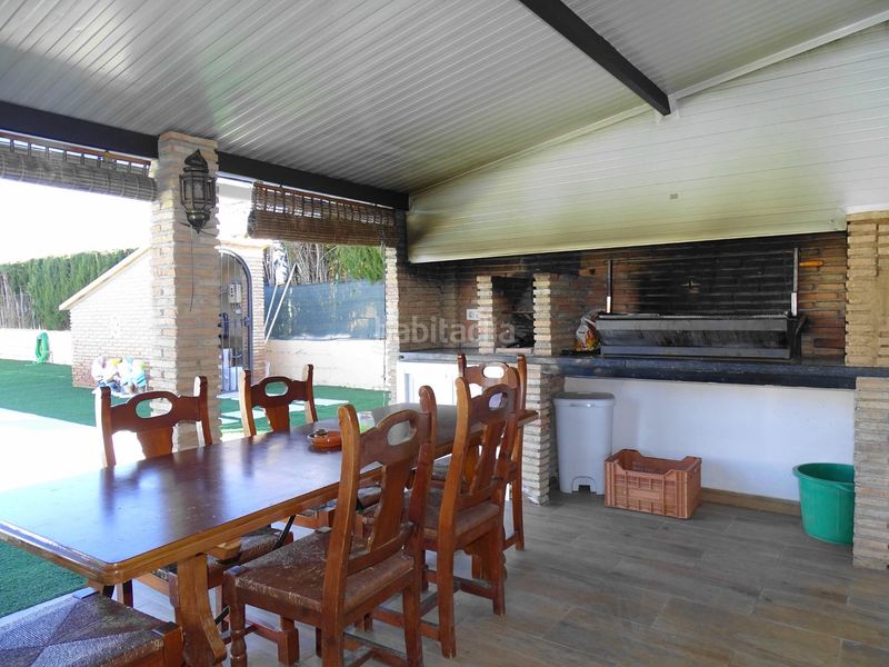 Foto b9c39e81-943f-4ab6-bf77-71f89a3ccf62. Xalet amb aparcament piscina a Atarfe