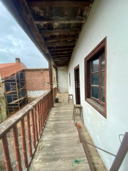 Foto 1f6ed41a-2763-4061-a4c9-3317067464e9. Casa adosada  de piedra estilo montañés en Reocín