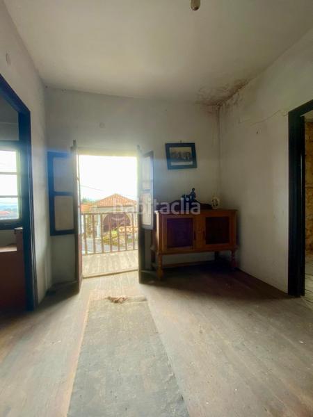 Foto 71ffd011-2367-4a92-8e03-b27df30d78d6. Casa adosada  de piedra estilo montañés en Reocín