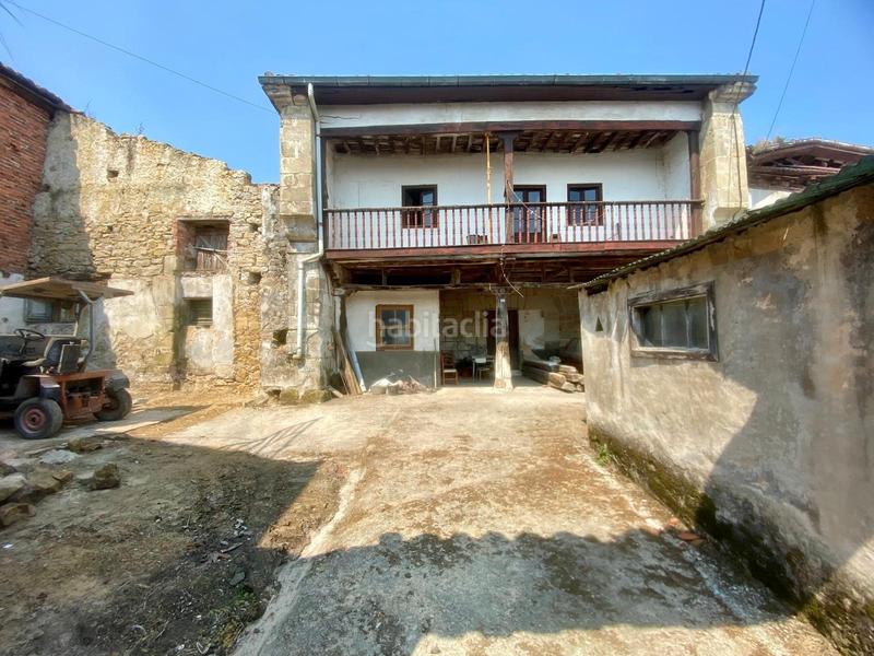Foto be17b8df-fab5-4b15-9e37-f2ff84ef0425. Casa adosada  de piedra estilo montañés en Reocín