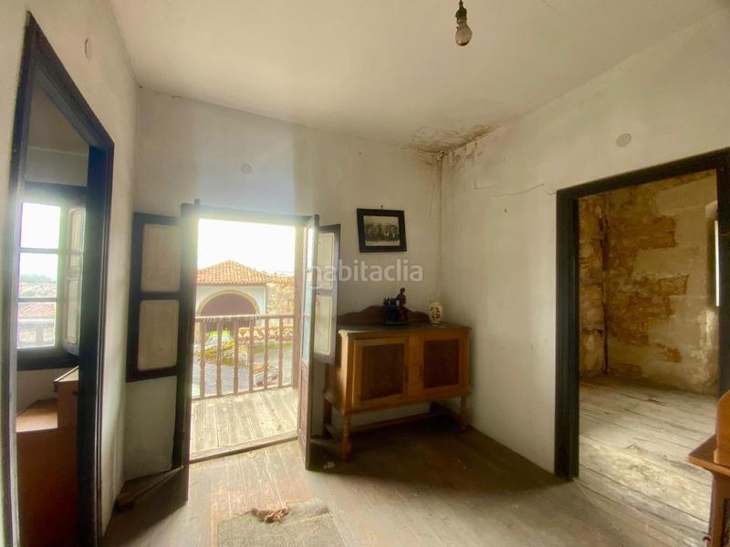 Foto e21753c0-e9eb-4c6c-8431-7aaa8621a6bb. Casa adosada  de piedra estilo montañés en Reocín