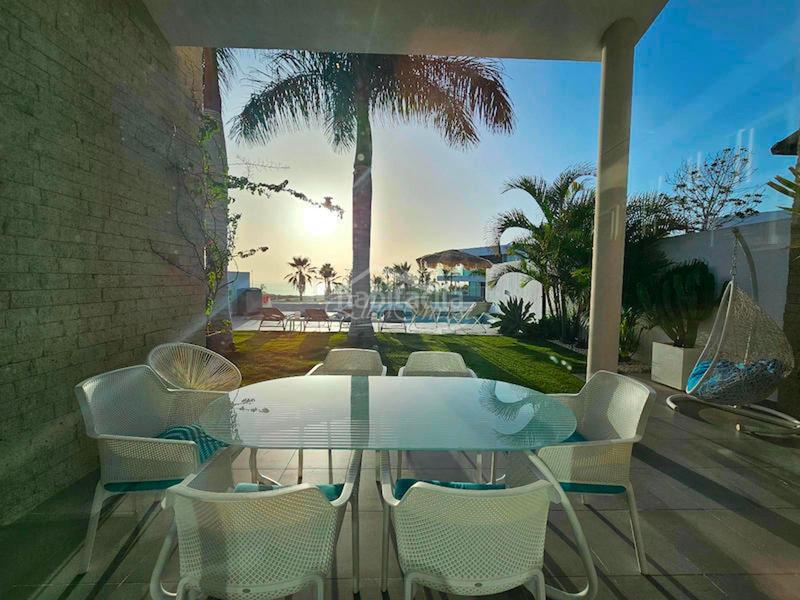 Foto 0a1cd5e0-e9b5-484f-ba47-30a7f7212d6a. Semi detached house with parking pool in La Caleta Adeje