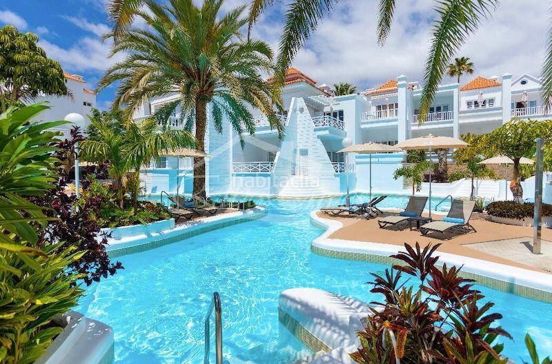 Foto 11e5faf4-7fb3-4de0-ab72-c336fdceb0a7. Reihenhaus mit pool in Playa de Fañabé Adeje