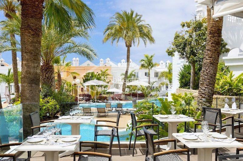 Foto a41ea318-05a2-4700-93cc-88088b995342. Reihenhaus mit pool in Playa de Fañabé Adeje