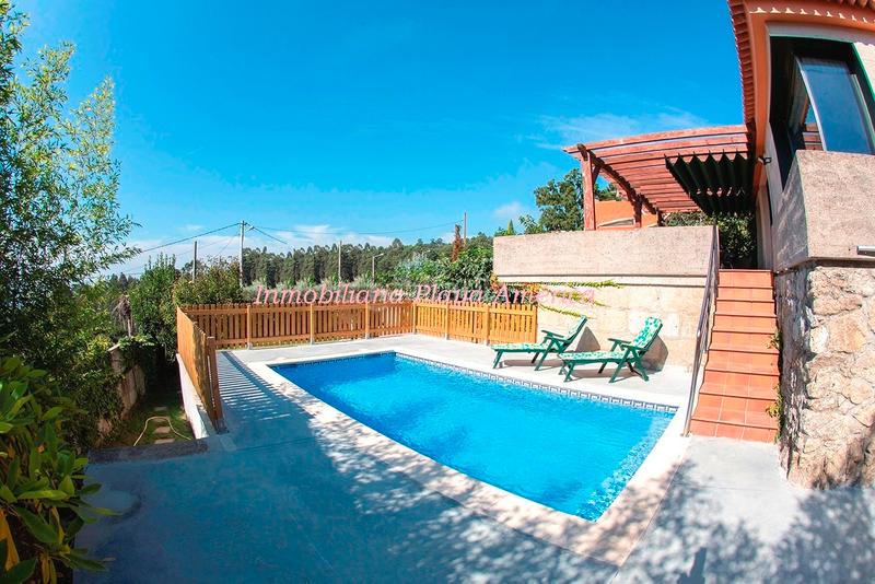 Foto 1513352d-2fb1-4f6e-8f0c-513f33967932. Chalet bonita casa rústica, con piscina y vistas al mar. en Nigrán