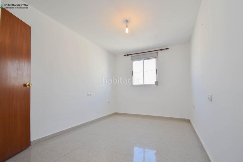 Foto 183d2b84-d636-48a9-a62e-302537cc8fc8. Casa adossada amb aparcament a Atarfe