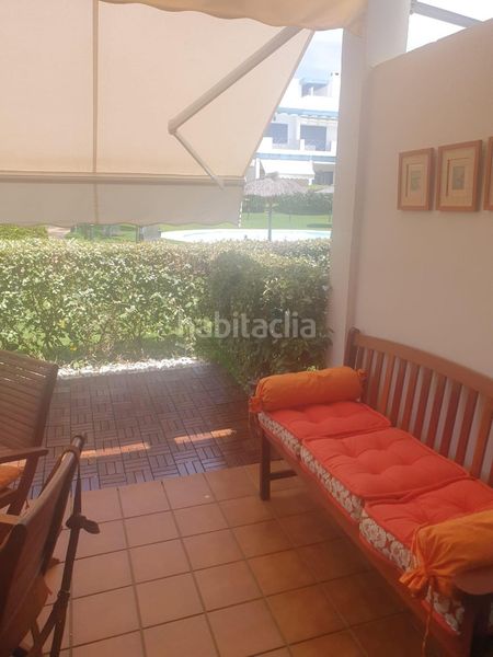 Foto 1472a98b-6742-4ef8-99cd-44e2600ce74a. Casa adossada a paseo del golf 2 a Islantilla golf Islantilla