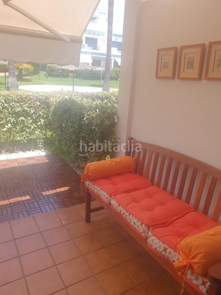 Foto 1525b4f6-f6c1-44de-88b2-f57abdaa93a2. Casa adossada a paseo del golf 2 a Islantilla golf Islantilla