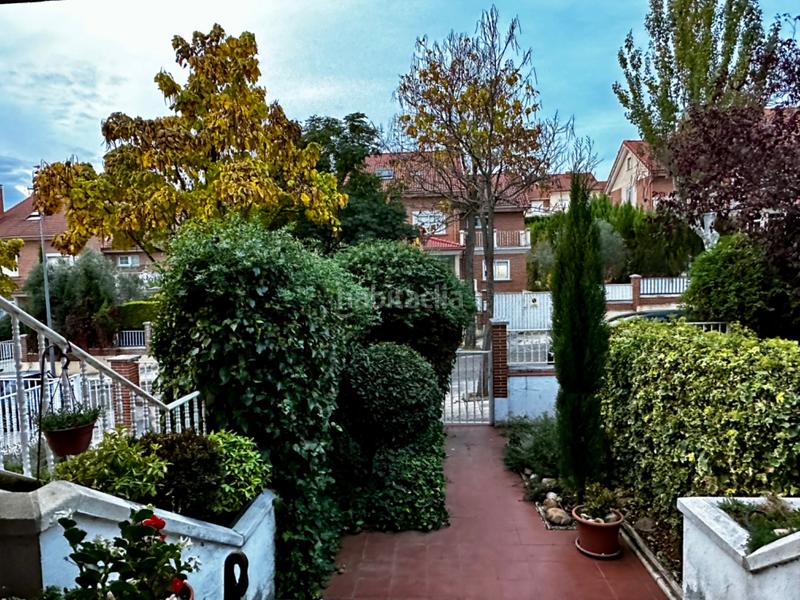 Foto b7d55817-df78-43cb-af39-cd0abfacf6d4. Casa aparellada amb xemeneia calefacció aparcament a Arroyo de la Encomienda