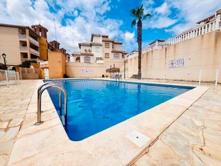 Casa a Lomas de Cabo Roig - Los Dolses. Acogedor apartamento de 2 habitaciones con jardín y piscina en e