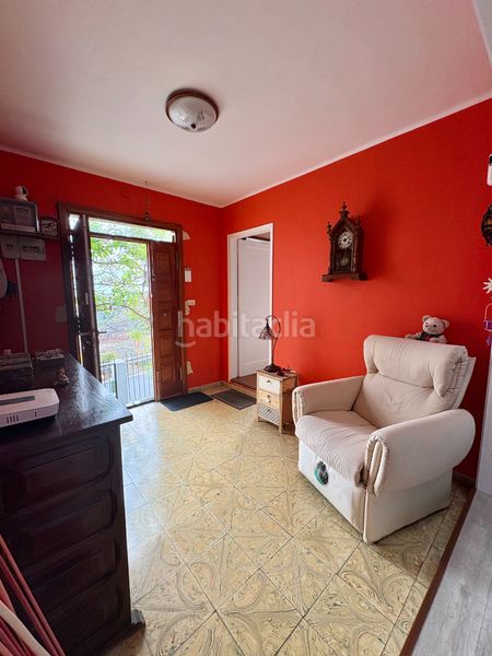 Foto 67a93498-5607-44f3-b3eb-8ac5fd991862. Casa aparellada amb aparcament a Moya