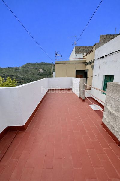Foto d50b69f0-cc01-4cc1-8fa6-d03e30154595. Casa aparellada amb aparcament a Moya