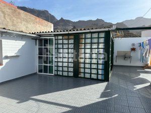 Foto 3509ebf6-0ca8-48ba-a946-80f2e6c45b62. Casa aparellada amb aparcament piscina a Los Almacigos - Veneguera Mogán