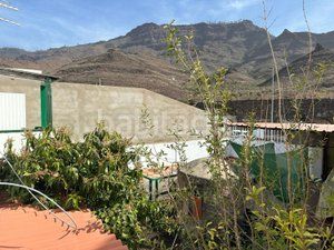 Foto 623d5267-02ae-4466-bdb5-aec3792a91e8. Casa aparellada amb aparcament piscina a Los Almacigos - Veneguera Mogán