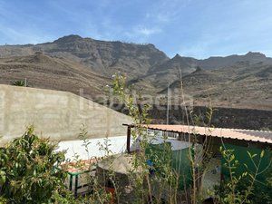 Foto 95011dcf-e350-404f-bf92-e44fd16f2787. Casa aparellada amb aparcament piscina a Los Almacigos - Veneguera Mogán