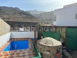 Foto 97959413-fe29-49e4-8d04-9fa7b02ece31. Casa aparellada amb aparcament piscina a Los Almacigos - Veneguera Mogán