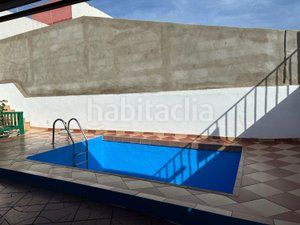Foto f51e2638-bd44-4a08-a271-f6e82354a107. Casa aparellada amb aparcament piscina a Los Almacigos - Veneguera Mogán