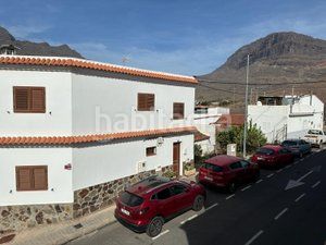 Foto ffa4ceea-a94b-46c7-a7dc-7aa1f992ddaf. Casa aparellada amb aparcament piscina a Los Almacigos - Veneguera Mogán