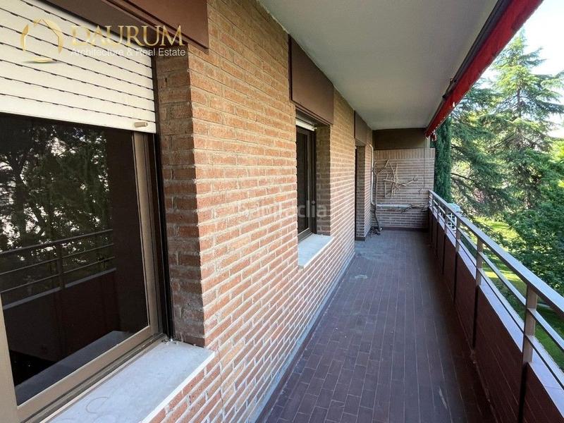 Foto d7f605fe-4ecf-4483-87c1-a220a090825e. Flat with parking pool in Peñagrande Madrid