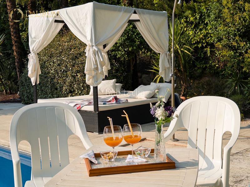 Foto 7d584fe4-a0f1-41f0-97a7-d250cc5b6db7. Chalet con riscaldamento parcheggio piscina in Montealina Pozuelo de Alarcón