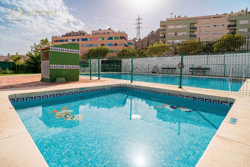 Foto dcc054ee-ff04-41c9-8fb7-5fbb95d1978c. Casa adossada amb calefacció aparcament piscina a Málaga