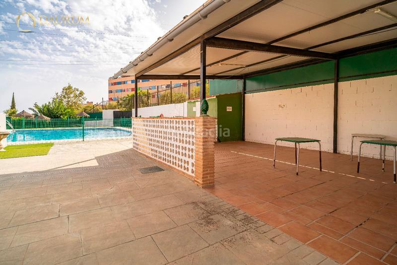 Foto f57d0a53-6fc3-425f-b20d-c96e7fd98c48. Casa adossada amb calefacció aparcament piscina a Málaga