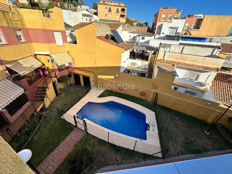 Foto 28f2972c-020a-4de8-a82f-8af17edc7ba6. Casa adossada amb calefacció aparcament piscina a Málaga