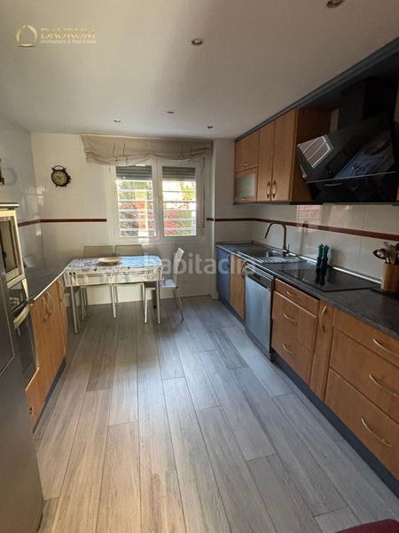 Foto f0051976-0bc1-4012-bbb3-3cb471aad588. Casa adossada amb calefacció aparcament piscina a Paracuellos de Jarama