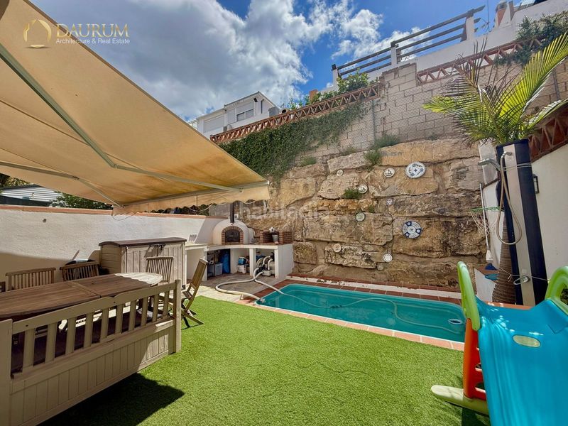Foto 4249c901-fcfa-4a90-b53d-81e746c80751. Casa adossada amb calefacció aparcament piscina a Marbella