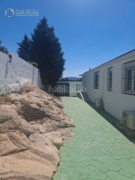Foto f69a9fe6-89a1-4e90-937c-c68968564f51. Xalet amb calefacció aparcament piscina a Los Ángeles de San Rafael Espinar (El)