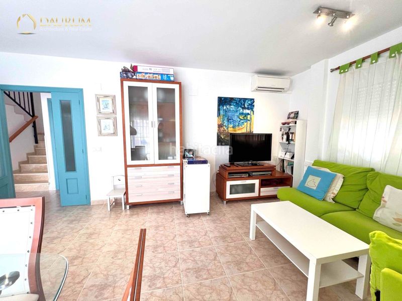 Foto 76d549ae-c764-44a4-84d6-6b0e12a5babe. Casa aparellada amb calefacció aparcament piscina a Cullera