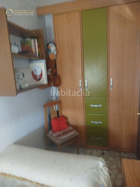 Foto baf302ab-1464-4cc7-a625-241c32cd27f3. Casa amb calefacció a Ciudad 70 Coslada