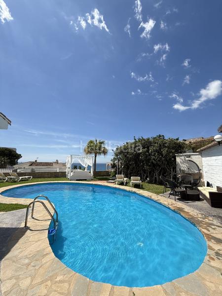 Foto af771be9-1cc2-4662-a1fa-5fddbca2d4f7. Chalet  en venta en Torremuelle, 2 dormitorios. en Benalmádena